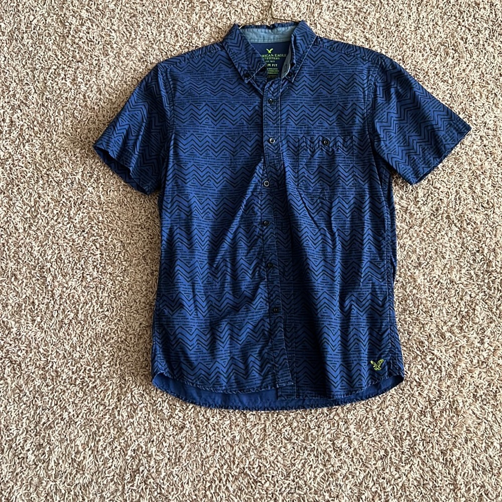 Used American eagle button up shirt. Size xs.